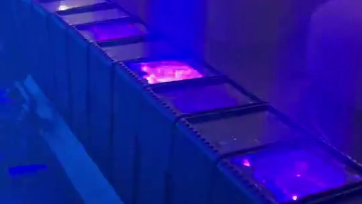 Moving LED Bar throwing aerial beams across a venue in Los Angeles