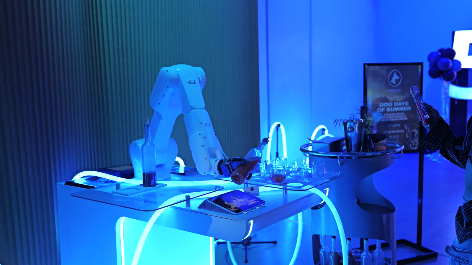 Robot bartender built into a branded scenic bottle